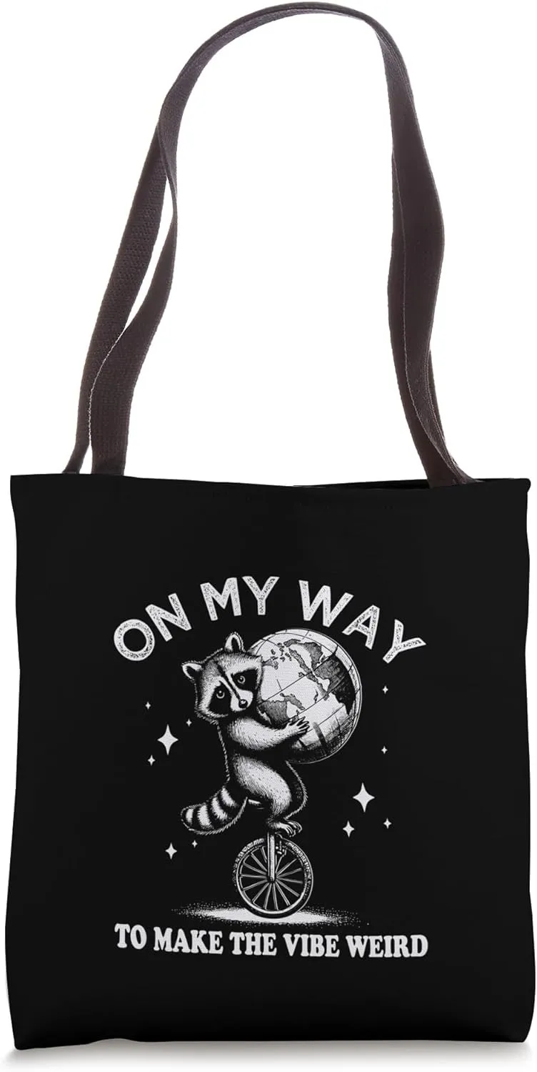 Raccoon Riding a Monocycle, On My Way to Make the Vibe Weird Tote Bag